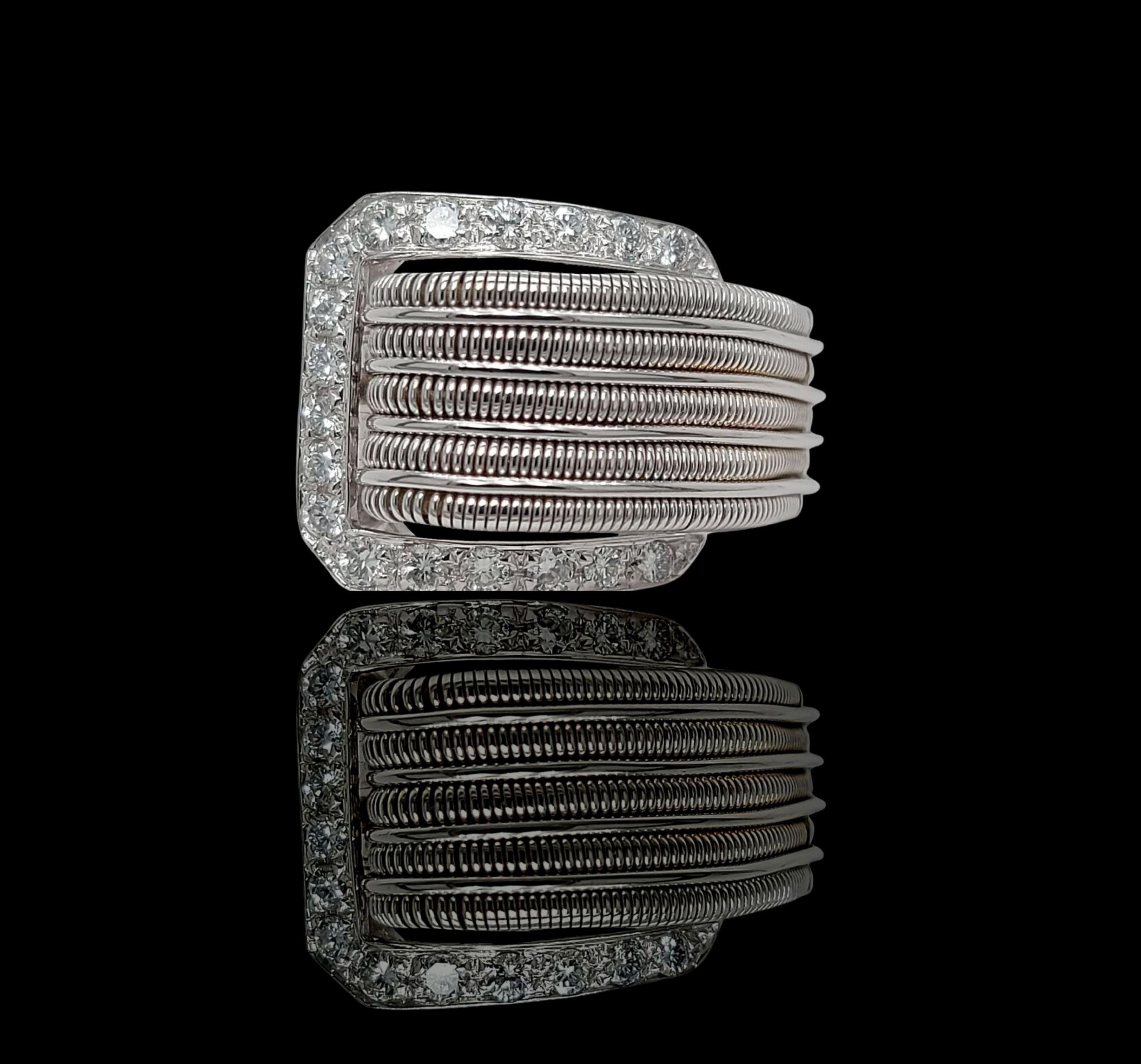 Gorgeous 18kt White Gold Belt Style Ring with 0.72ct Brilliant Cut Diamonds

Diamonds: 18 diamonds together 0.72ct 

Material:  18kt White gold

Ring size: 55 EU / 7.25 US 5 (can be resized for free)

Total weight: 13.6 gram / 0.480 oz / 8.7 dwt
