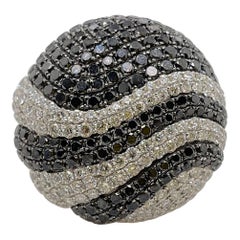 18kt White Gold Black 
White Diamond Swirl Cocktail Ring