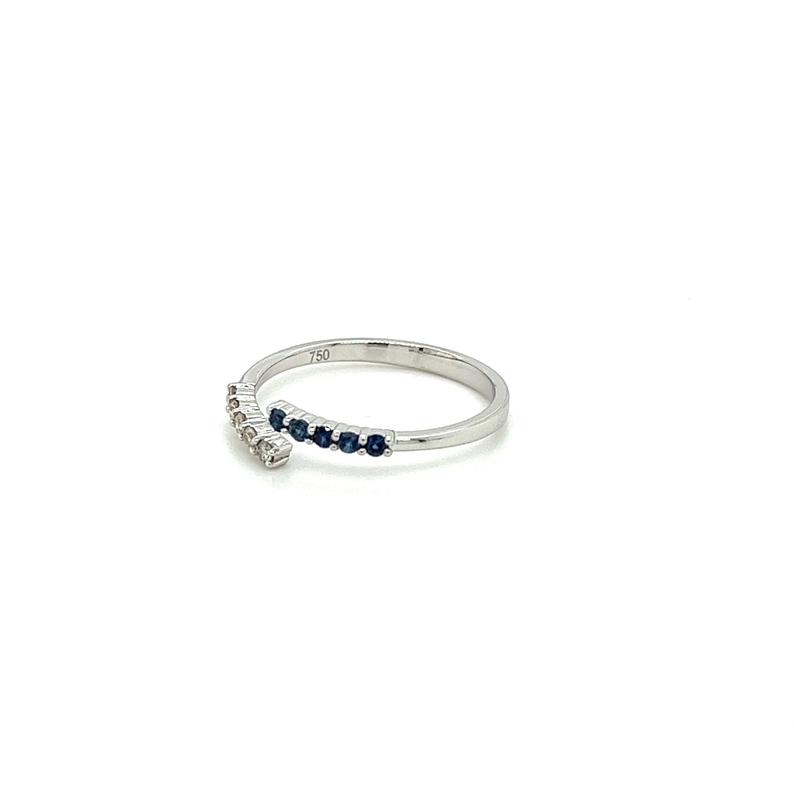 Cute, dainty, and stackable 18-karat solid white gold crossover bypass ring. Set with 10 round-cut natural Blue Sapphires and Diamonds. Hypoallergenic and 100% waterproof. Ideal for daily wear.

The perfect fine jewelry gift that doesn't break the