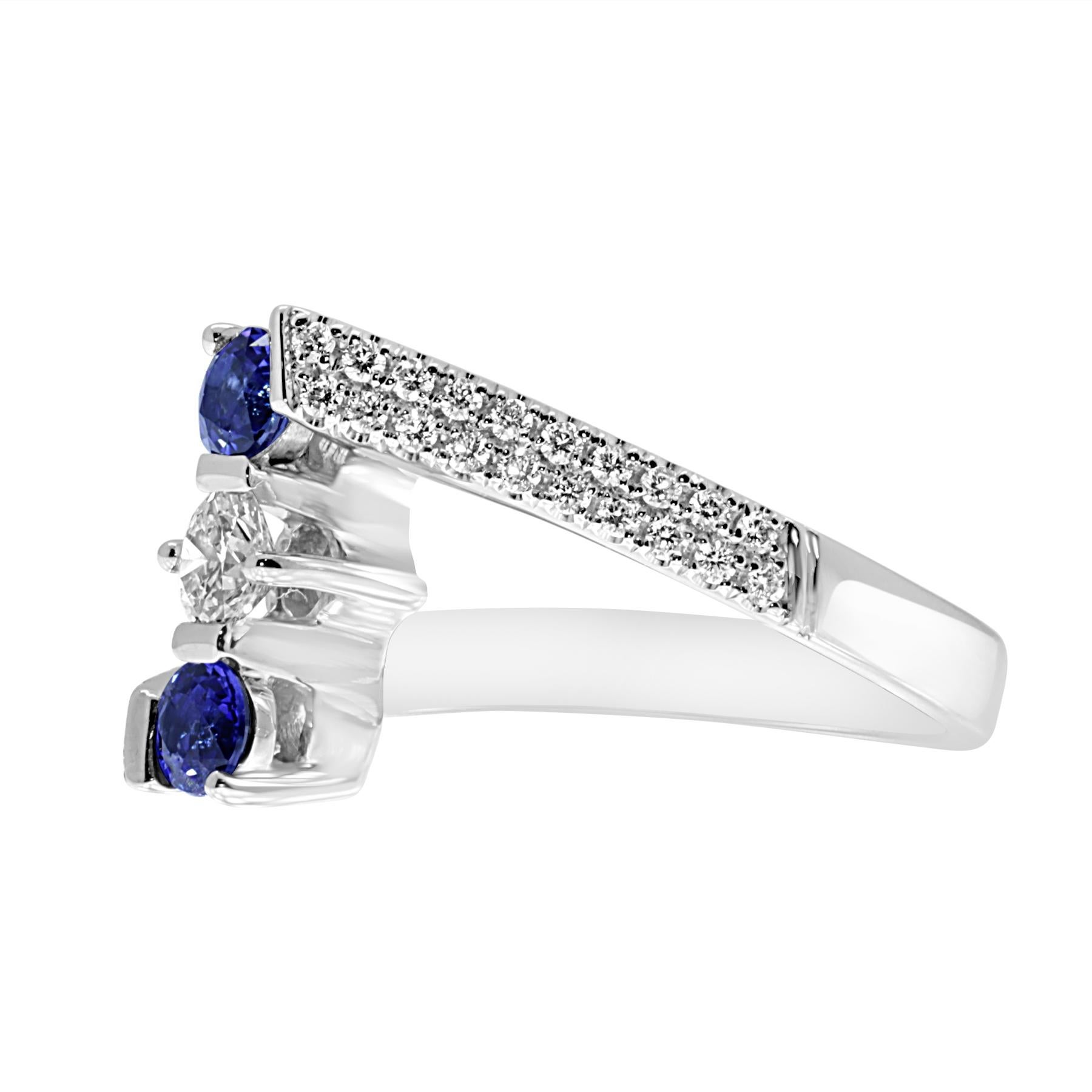 this unique piece is made of 18kt white gold, featuring two round cut blue sapphires of 0.59ct in total 
and (41) white brilliant cut diamonds. 
to make this piece more prestigious we've decided to add two rows of pave set diamonds on each side.
a