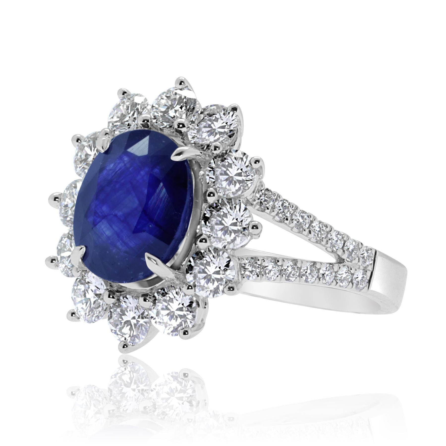 gorgeous ring in 18kt white gold, weighs 7.9 grams.
the ring features a big blue sapphire of 4.69ct , surrounded by brilliant cut diamonds of 2.01ct in total.
ring size is 53 Belgian size and can be resized as per clients request.
a short video of