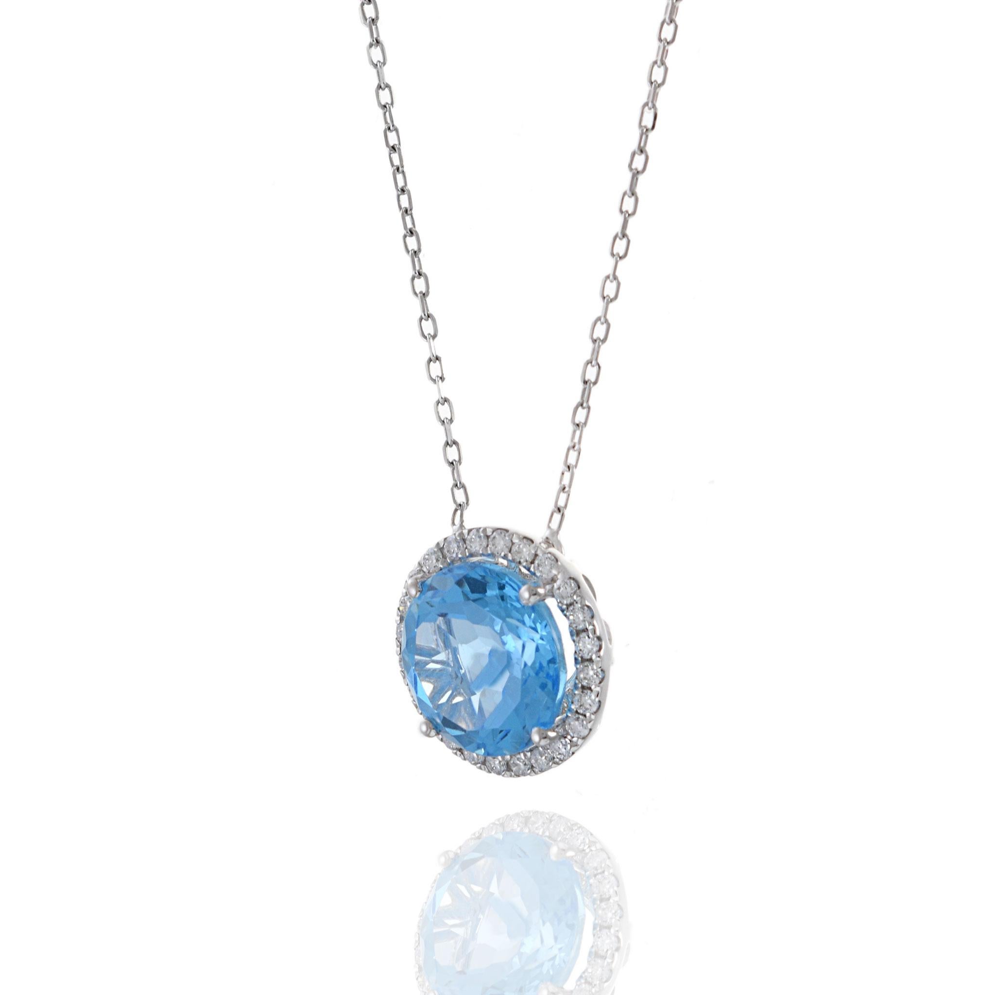 Modern 18KT White Gold Blue Topaz And Diamond Necklace For Sale