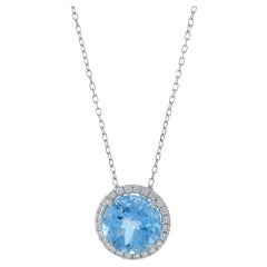 Collier en or blanc 18 carats, topaze bleue et diamant