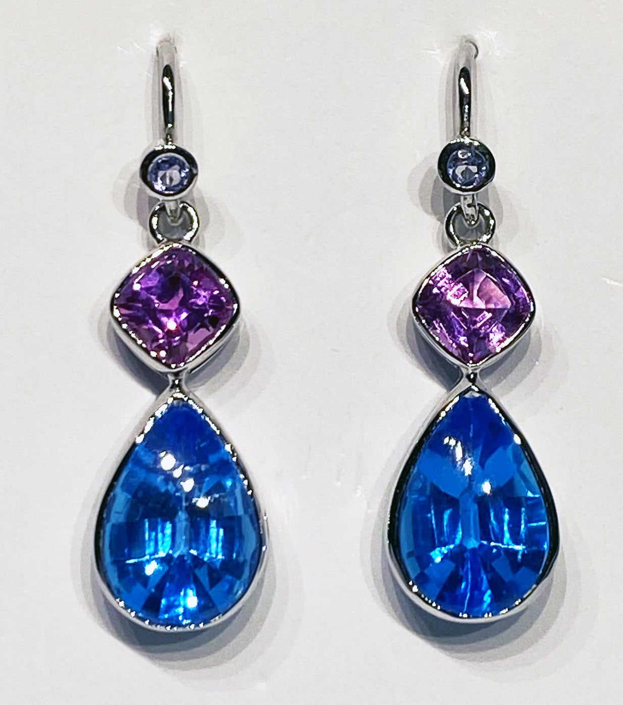 Modern 18kt White Gold, Blue Topaz & Pink Sapphire Earrings For Sale