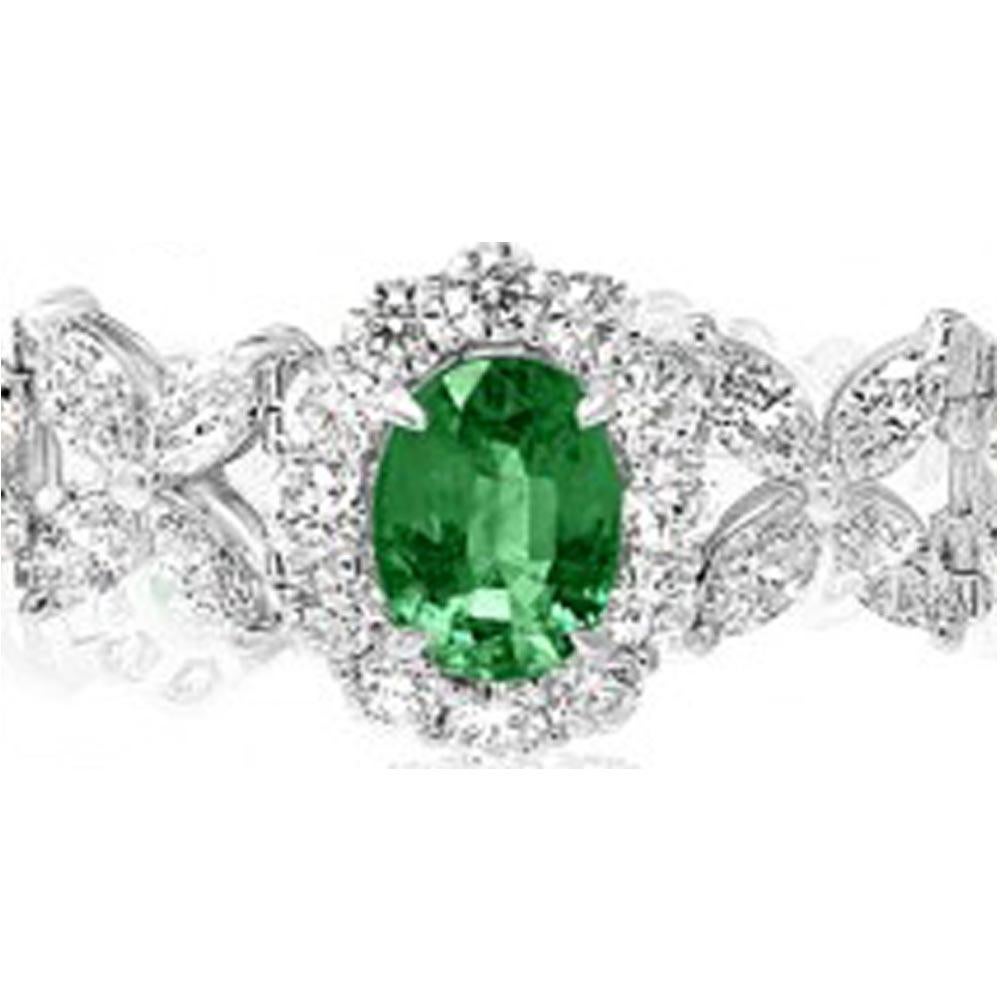 Contemporary 18kt White Gold Bracelet 10.27ct Oval Emeralds and 13.46ct of Mixed Diamond Cuts For Sale