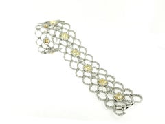 18 Karat White Gold Bracelet with Fancy Yellow Radiant Cut Diamonds