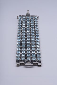 18KT White Gold Bracelet with White Diamonds, Blue Sapphires, and Blue Topaz