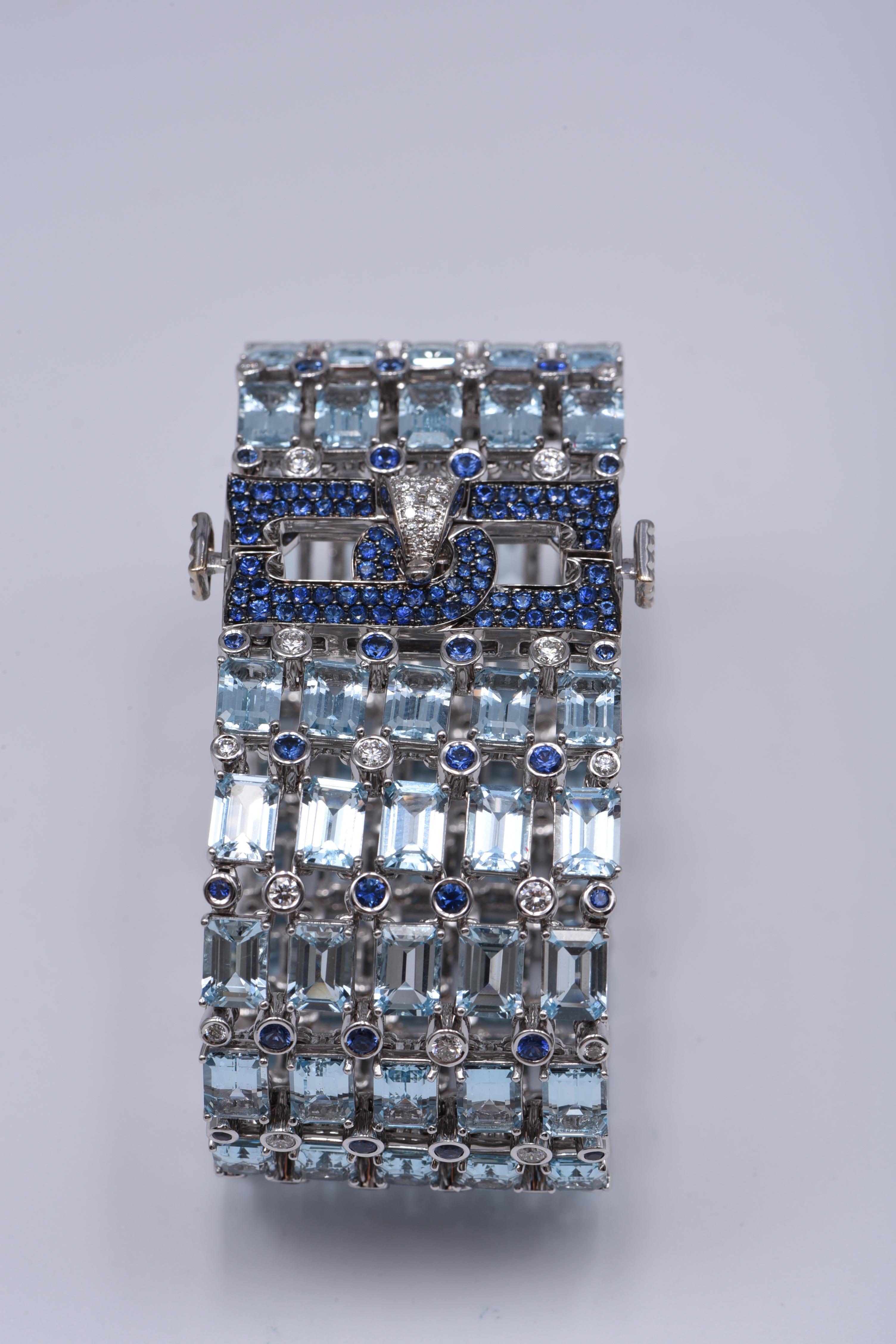 18KT White Gold Bracelet with White Diamonds, Blue Sapphires, and Blue Topaz In New Condition For Sale In Huntington, NY