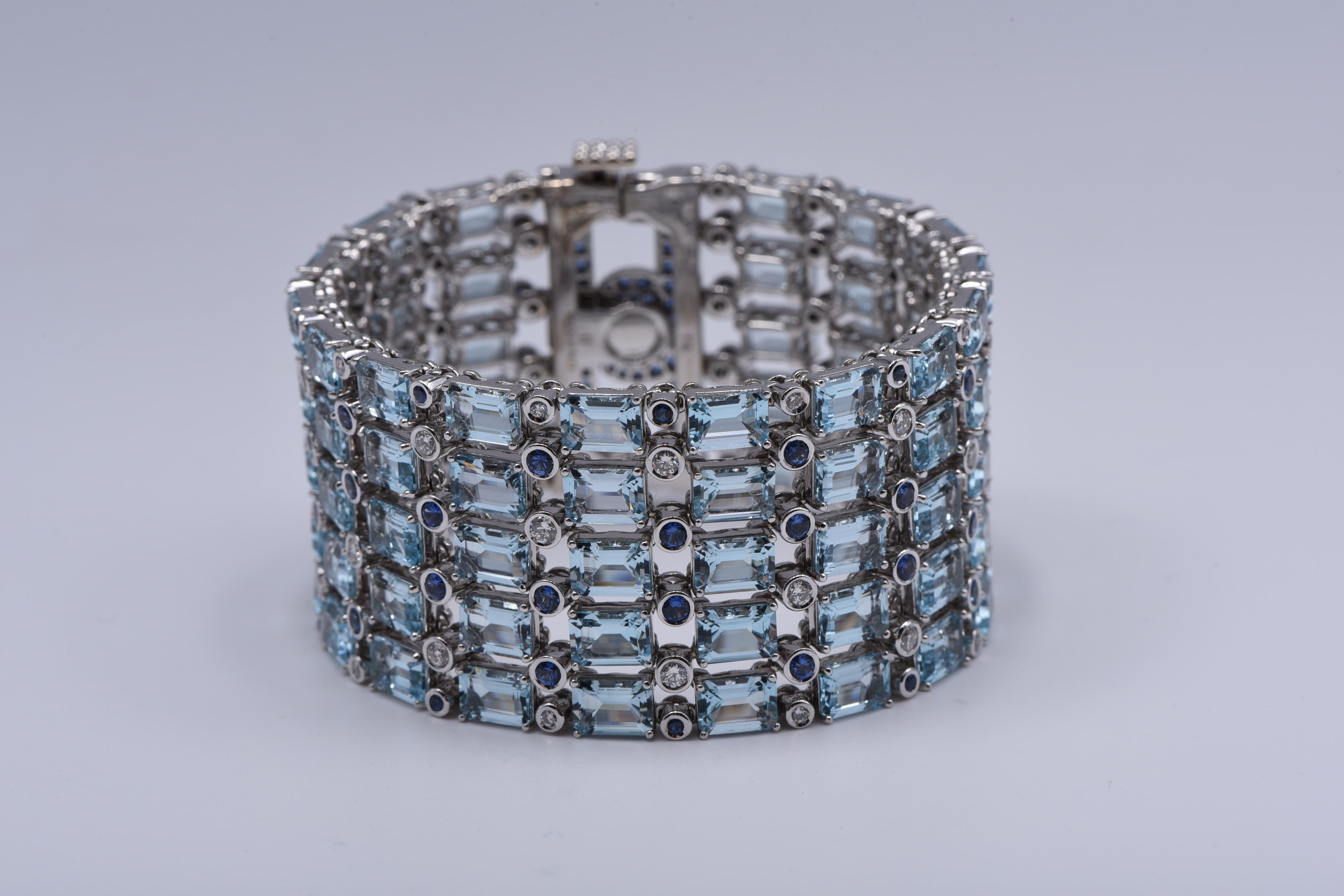 Women's or Men's 18KT White Gold Bracelet with White Diamonds, Blue Sapphires, and Blue Topaz For Sale