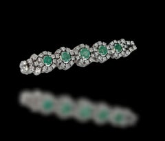 18kt White Gold Brooch with Emeralds & 2.7 Ct Diamonds