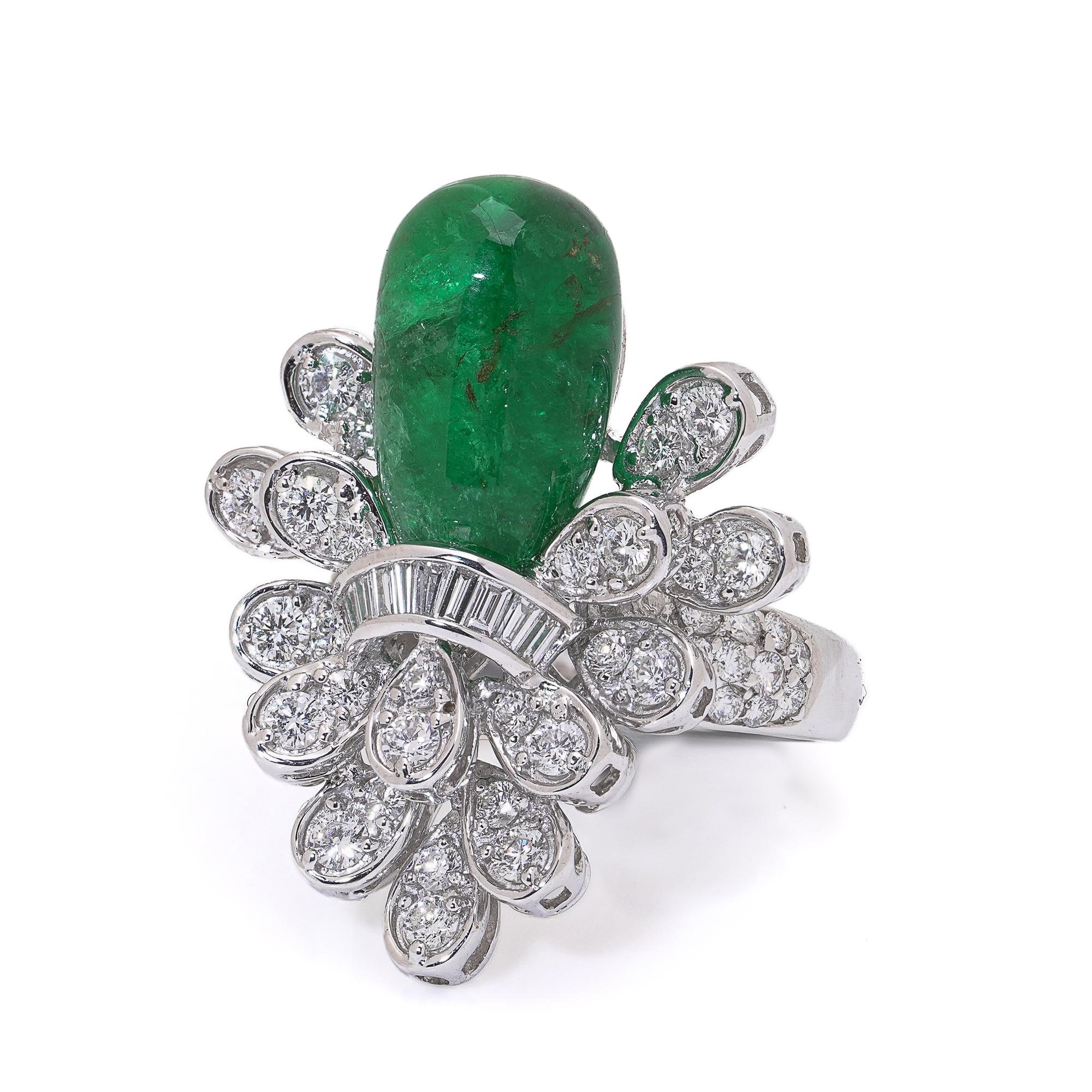 18kt White Gold Cabochon Emerald and Diamond Cluster Ring

Description
A striking 18kt white gold ring showcasing an impressive cabochon-cut emerald of approximately 13 carats. The vibrant green emerald forms the centrepiece of a lavish diamond