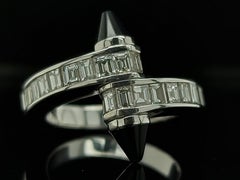 18 Karat White Gold Cartier Menotte Baguette Diamond and Onyx Ring