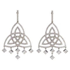 Orecchini Chandelier in oro bianco 18 carati con diamanti taglio brillante e smeraldo