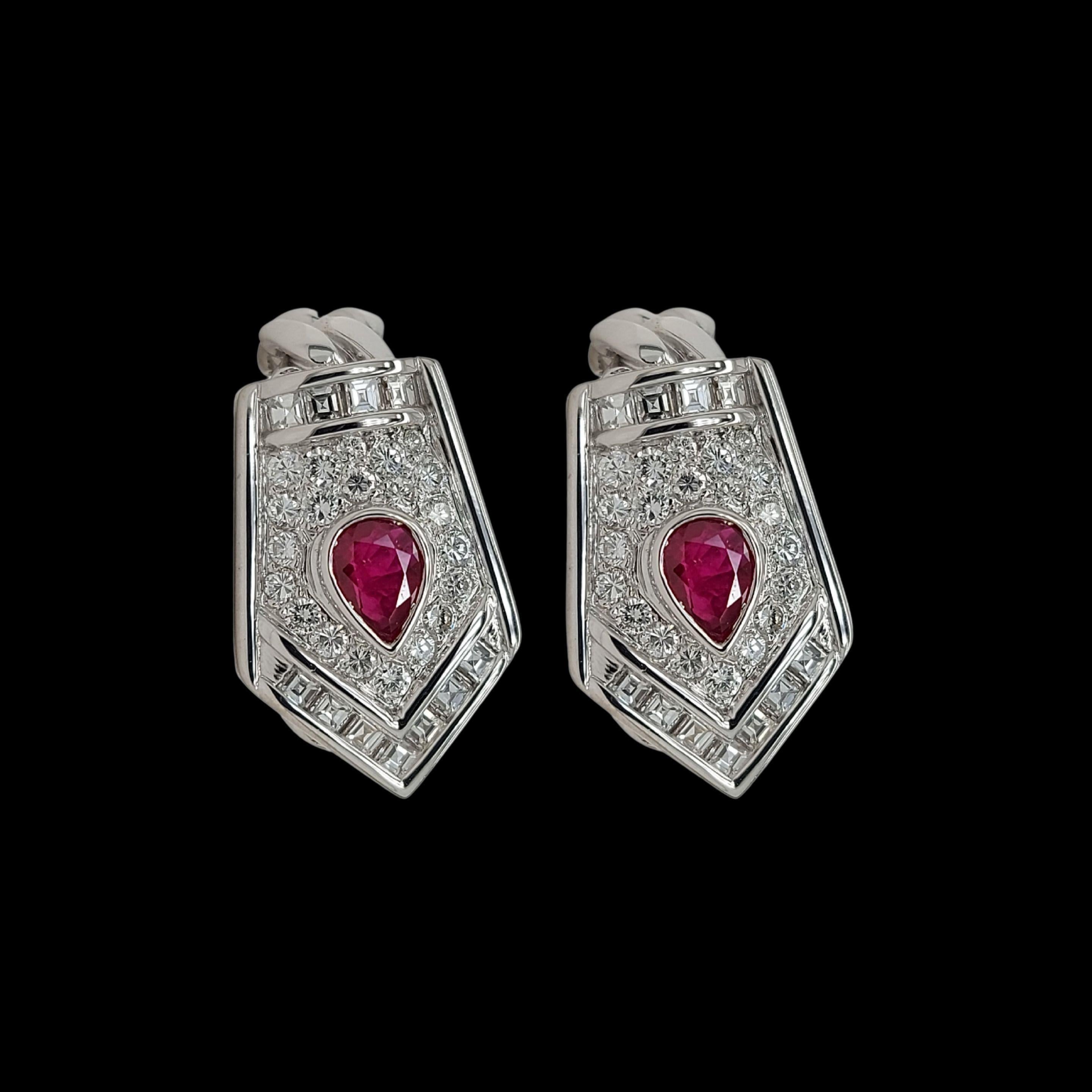Gorgeous 18kt White Gold Clip-On Earrings With Pear Shape Ruby and Diamonds 

Diamonds: 12 square cut 
20 brilliant cut diamonds, together 0.4ct

Ruby: pear shape ruby

Material: 18kt White Gold

Total weight: 11.6 gram / 0.410 oz / 7.5