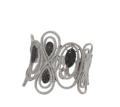 Bracciale in oro bianco 18kt con 5,79ct di diamanti neri e 8,12ct di diamanti bianchi