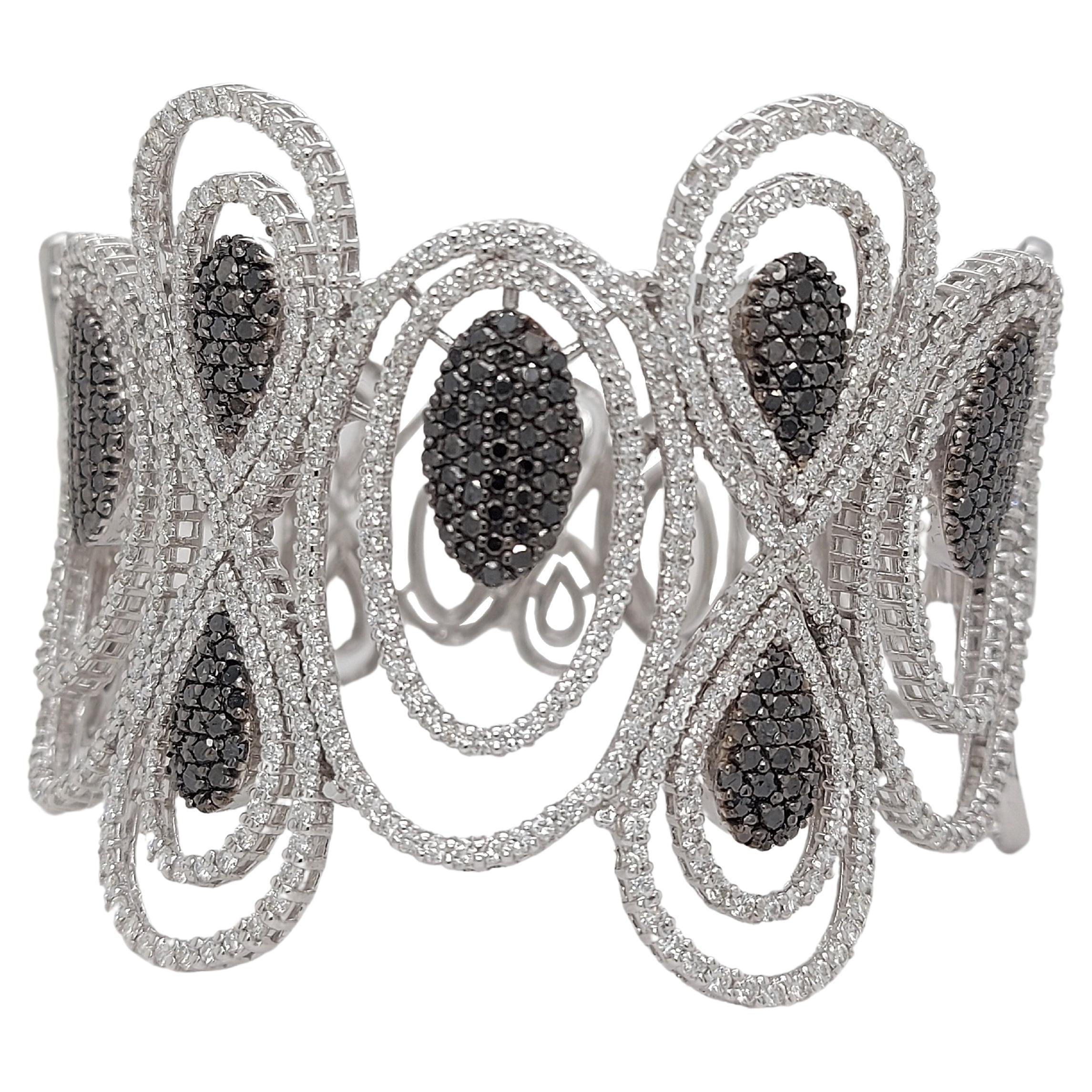 18kt White Gold Cuff Bracelet with 5.79ct Black and 8.12ct White Diamonds