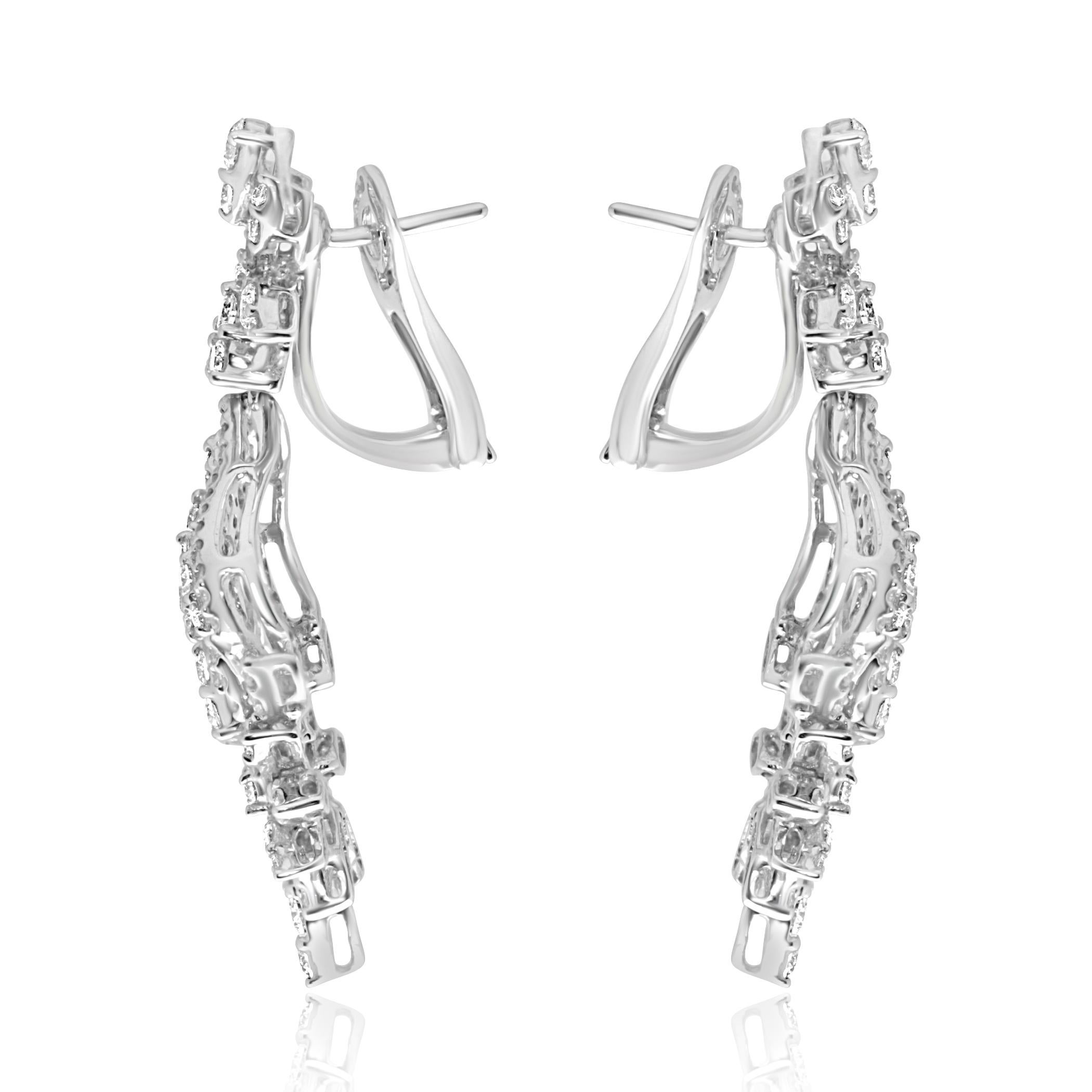 light up your look with this amazing pair of earrings!
they'll sure make a standout addition to your collection.
made of 18kt white gold , weighing 12 grams and set with beautiful bright brilliant cut diamonds of 3.70ct in total.
omega back clip.
