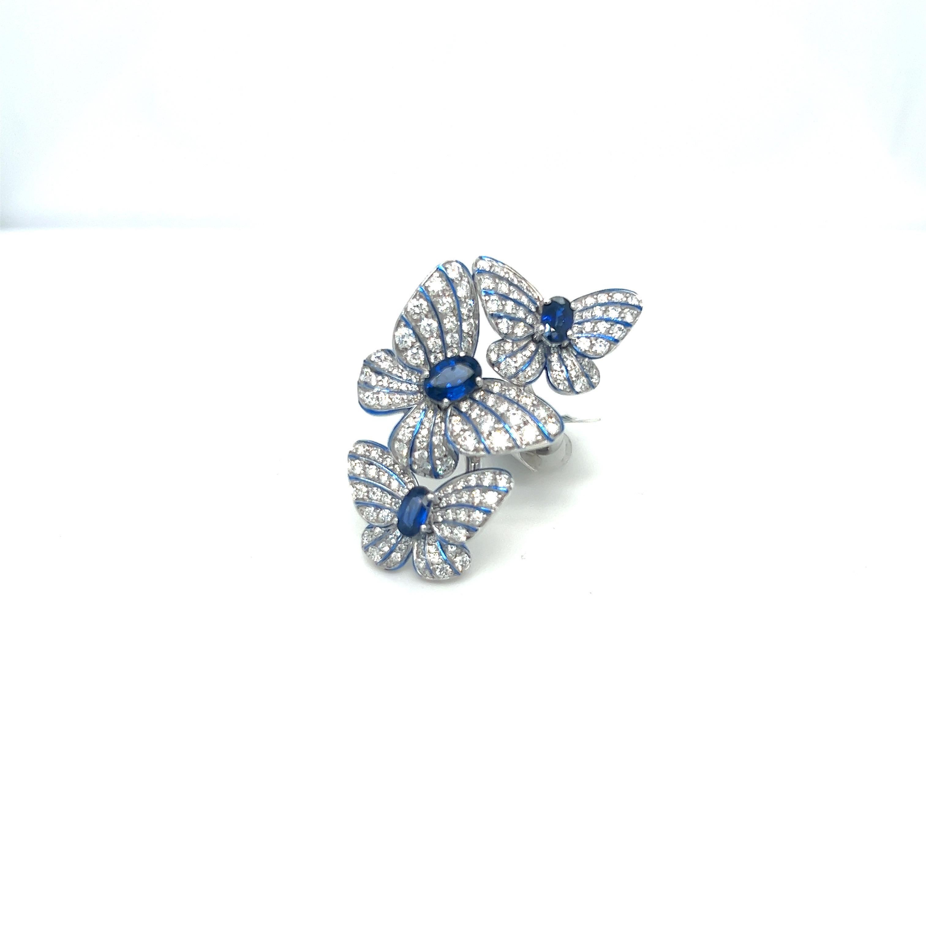 Modern 18kt White Gold Diamond 1.56ct. Blue Sapphire 1.18 Carat Triple Butterfly Ring For Sale