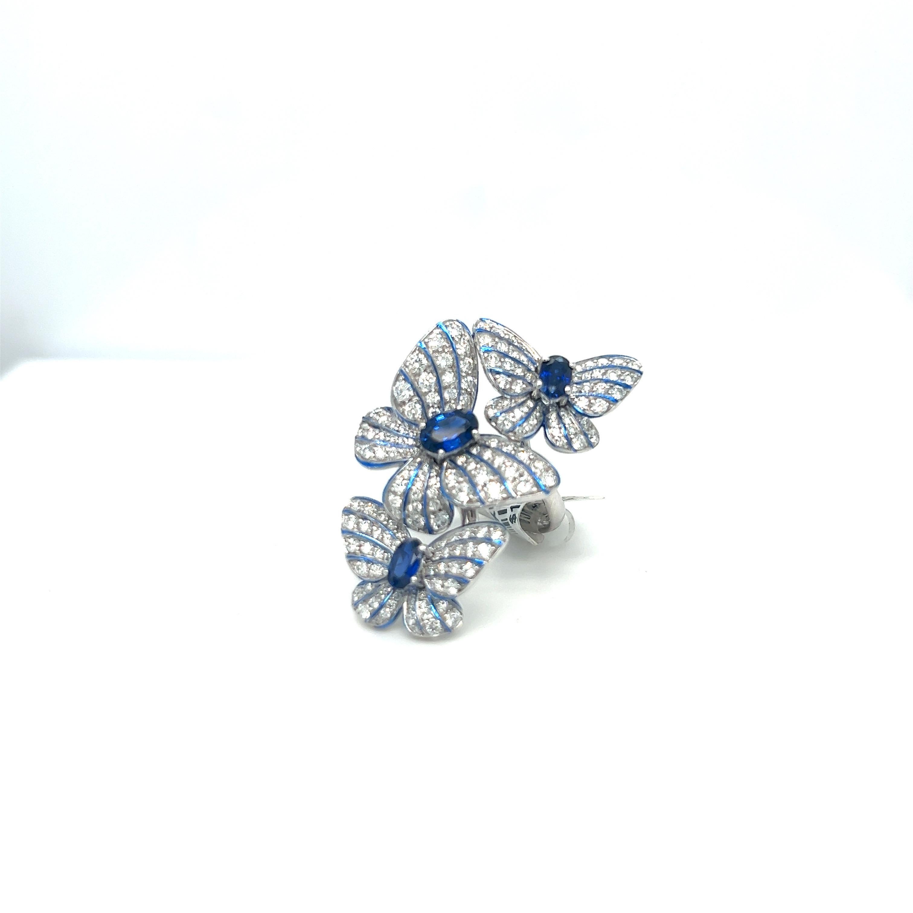 Women's or Men's 18kt White Gold Diamond 1.56ct. Blue Sapphire 1.18 Carat Triple Butterfly Ring For Sale