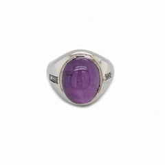 18 Karat White Gold Diamond and a 10 Carat Purple Star Sapphire