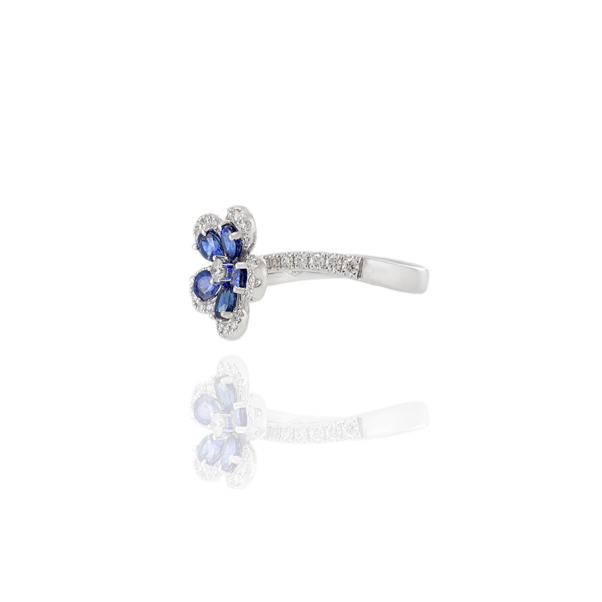 Round Cut 18KT White Gold Diamond And Sapphire Flower Ring For Sale