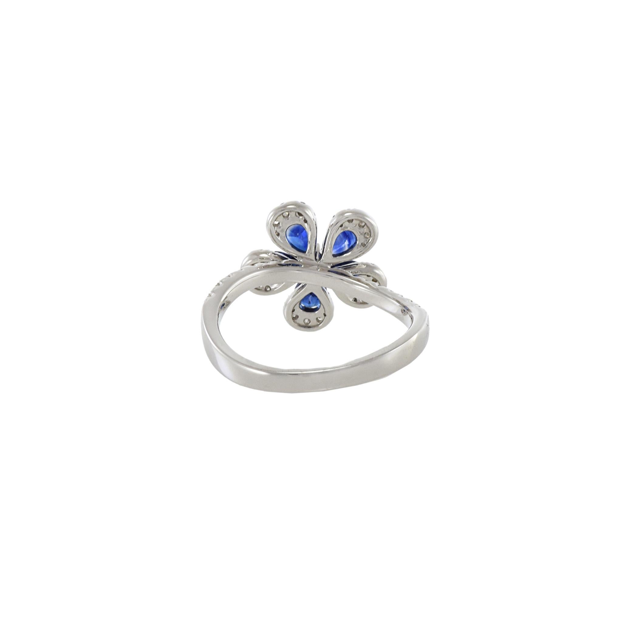 18KT White Gold Diamond And Sapphire Flower Ring In Excellent Condition For Sale In New York, NY