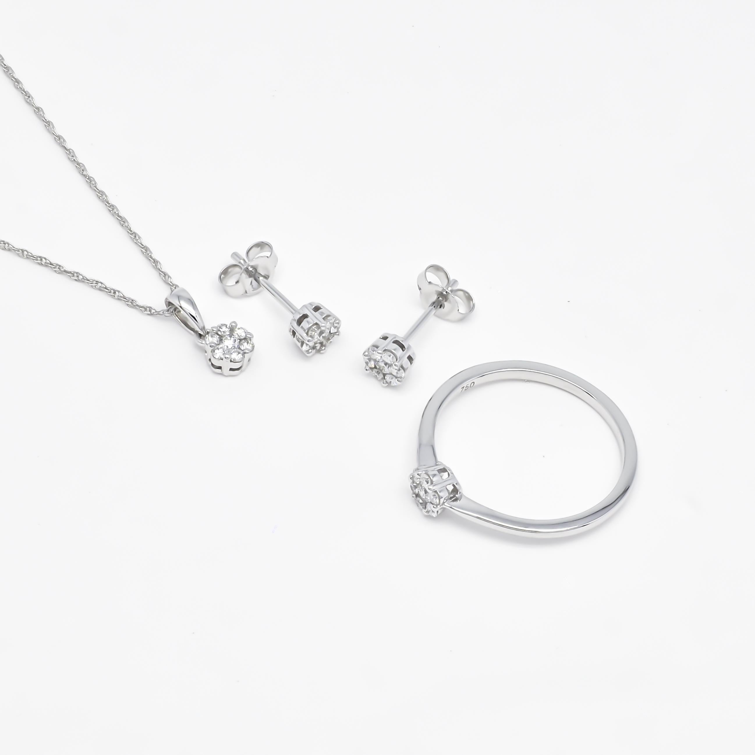 Elevate your special day with the enchanting allure of this Natural Diamond Jewelry Set, a breathtaking ensemble crafted in 18KT white gold—a testament to timeless sophistication and enduring beauty. This meticulously designed bridal jewelry set is