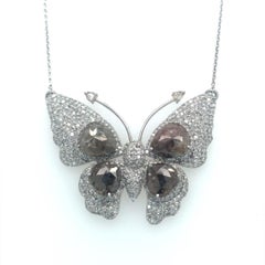 Collier papillon en or blanc 18Kt et diamants