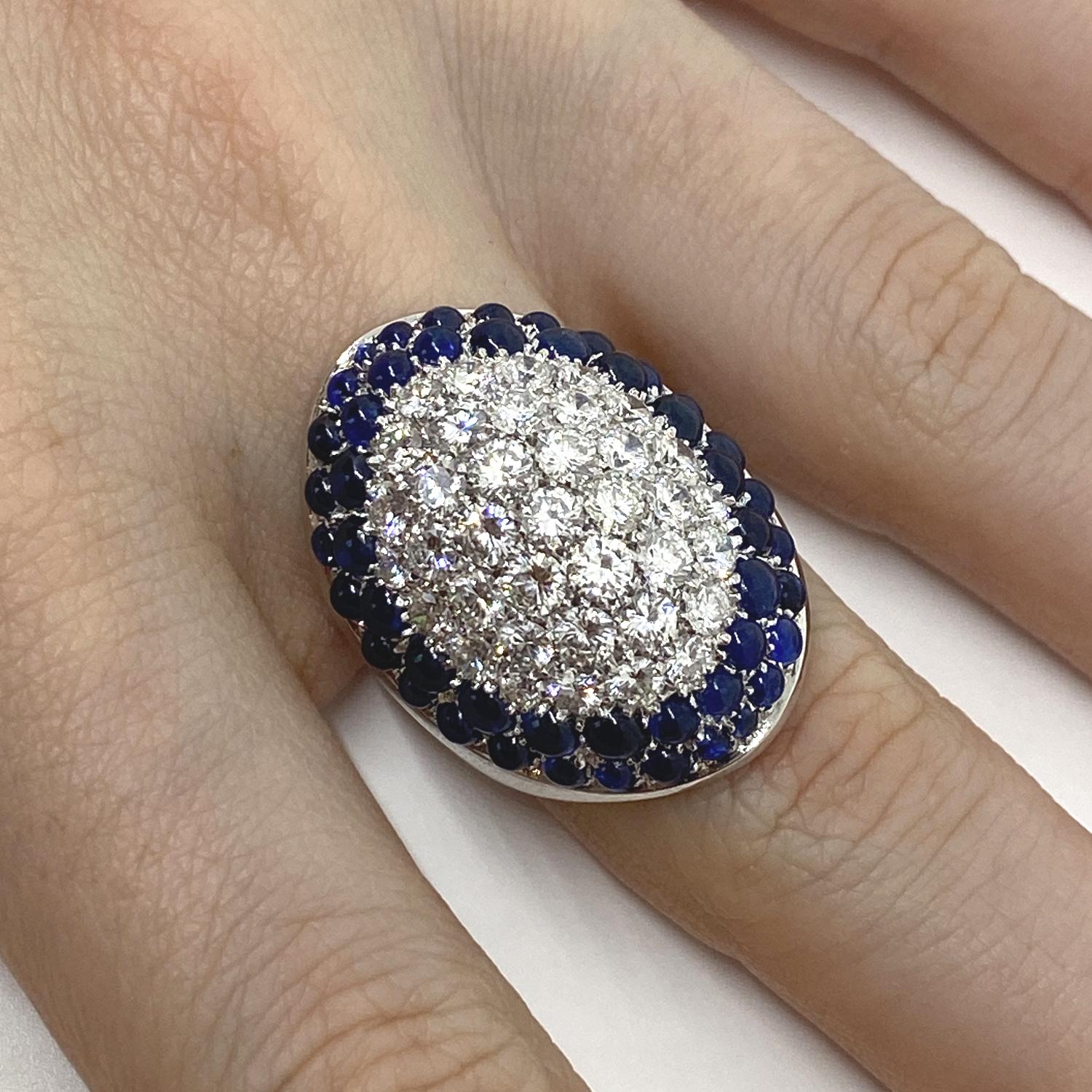 Ring made of 18kt white gold paved with brilliant-cut white natural diamonds for ct.3.97 and Cabochon-cut blue sapphires for ct.6.2

Welcome to our jewelry collection, where every piece tells a story of timeless elegance and unparalleled