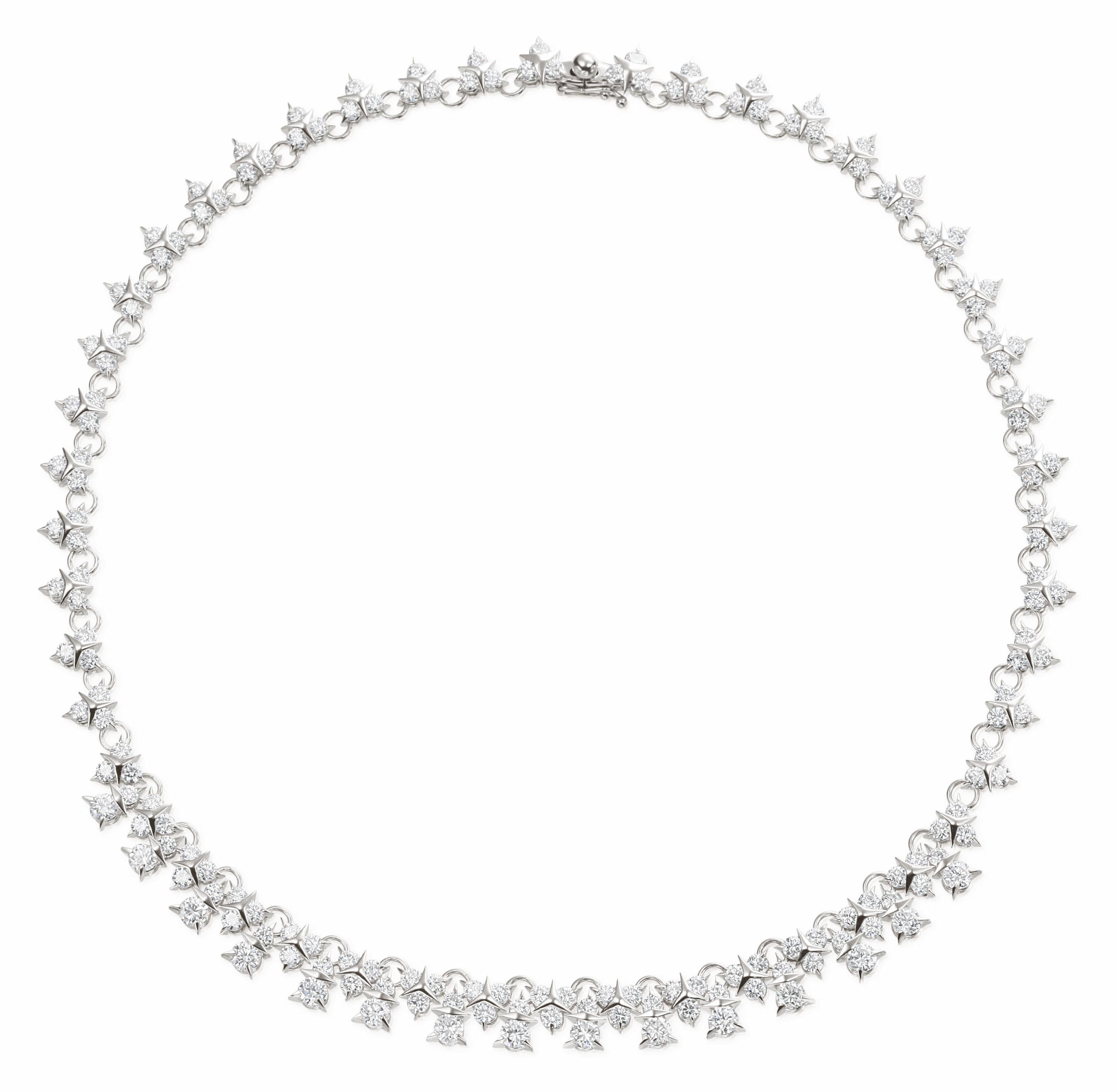 Illuminez votre look de tous les jours avec ces éblouissantes boucles d'oreilles Garavelli Diamonds Small Star !
Réalisés en or blanc 18 carats, ces clous d'oreilles étincelants sont ornés de trois diamants blancs éblouissants en forme d'étoile