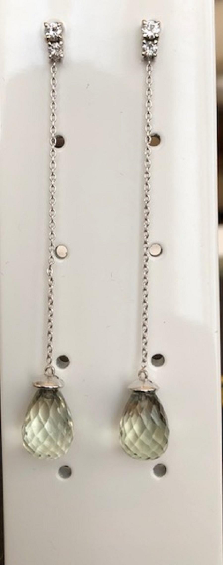 Orecchini in oro bianco con 2 diamanti taglio brillante per un totale di circa 0,16 carati di qualità H/VS, 2 diamanti taglio brillante per un totale di circa 0,08 carati H/VS e 2 ametiste sfaccettate a forma di goccia di 9,80 carati.
Contenuto