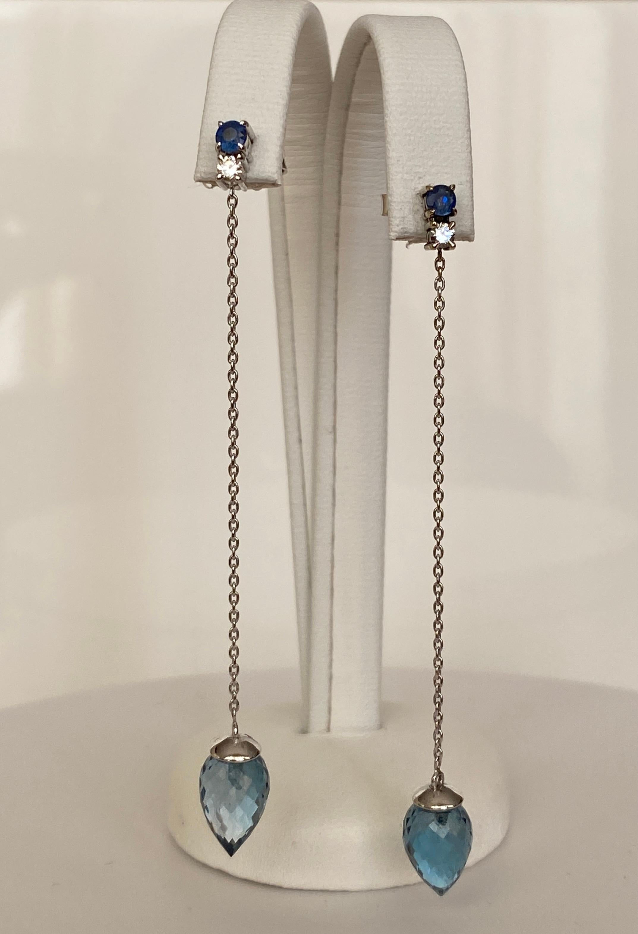 Orecchini a perno in oro bianco con 2 diamanti taglio brillante per un totale di circa 0,10 carati di qualità H/VS, 2 zaffiri per un totale di circa 0,18 carati e 2 sfaccettature a forma di goccia.  Topazio di Londra di circa 8,00 carati
Contenuto