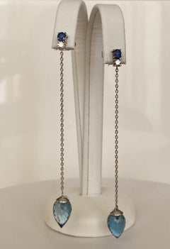 Boucles d'oreilles pendantes en or blanc 18 carats avec topaze bleue de Londres, saphir et diamants