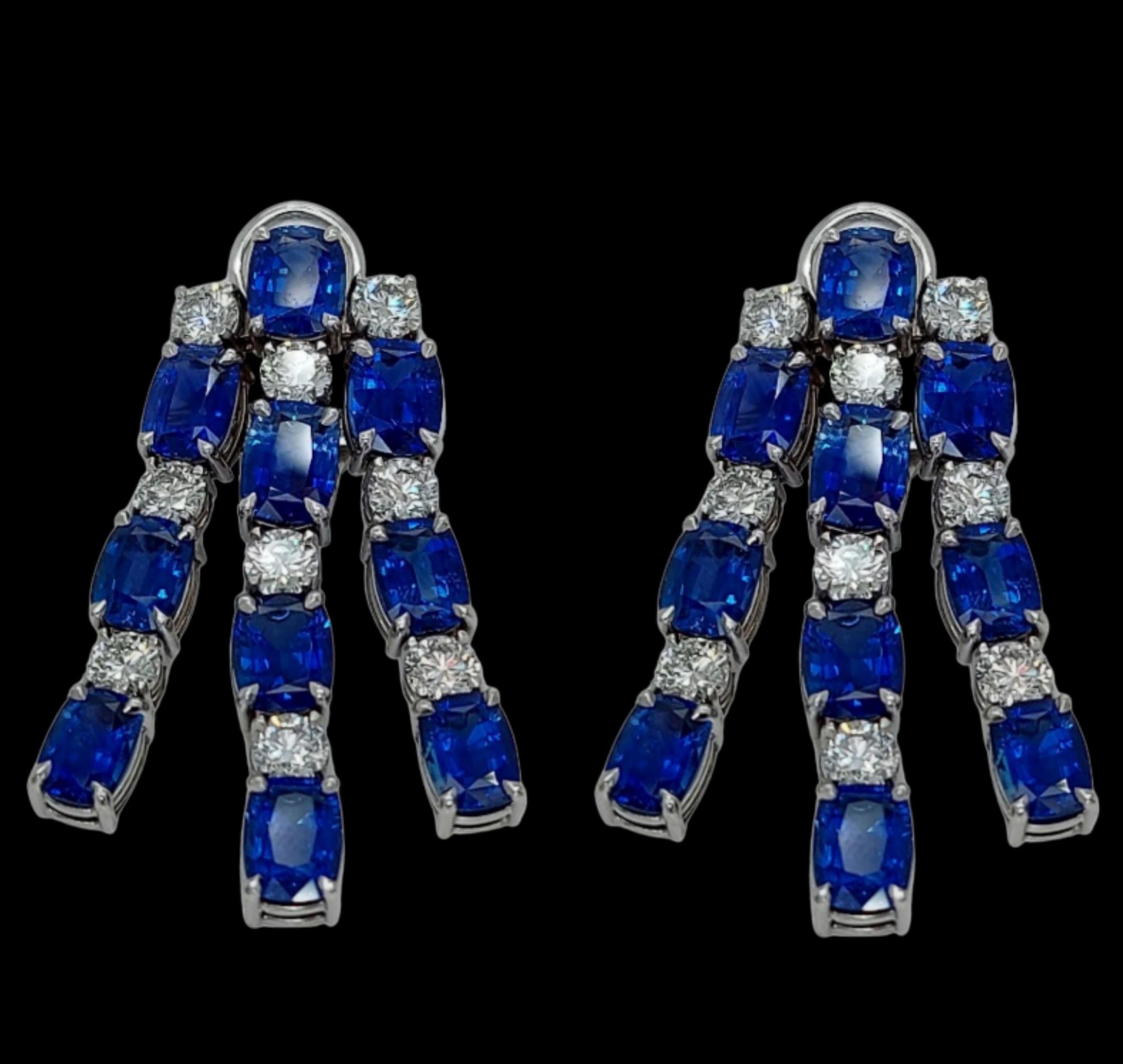 18kt White Gold Earrings with 21.42ct Sapphires, 5.09ct Diamonds, CGL Certified

Extremely nice sapphire and diamond earrings.

Sapphires: 20 Ceylon/Madagascar sapphires together 21.42 carat in total. Vivid blue, Cushion shape, Variety of corundum