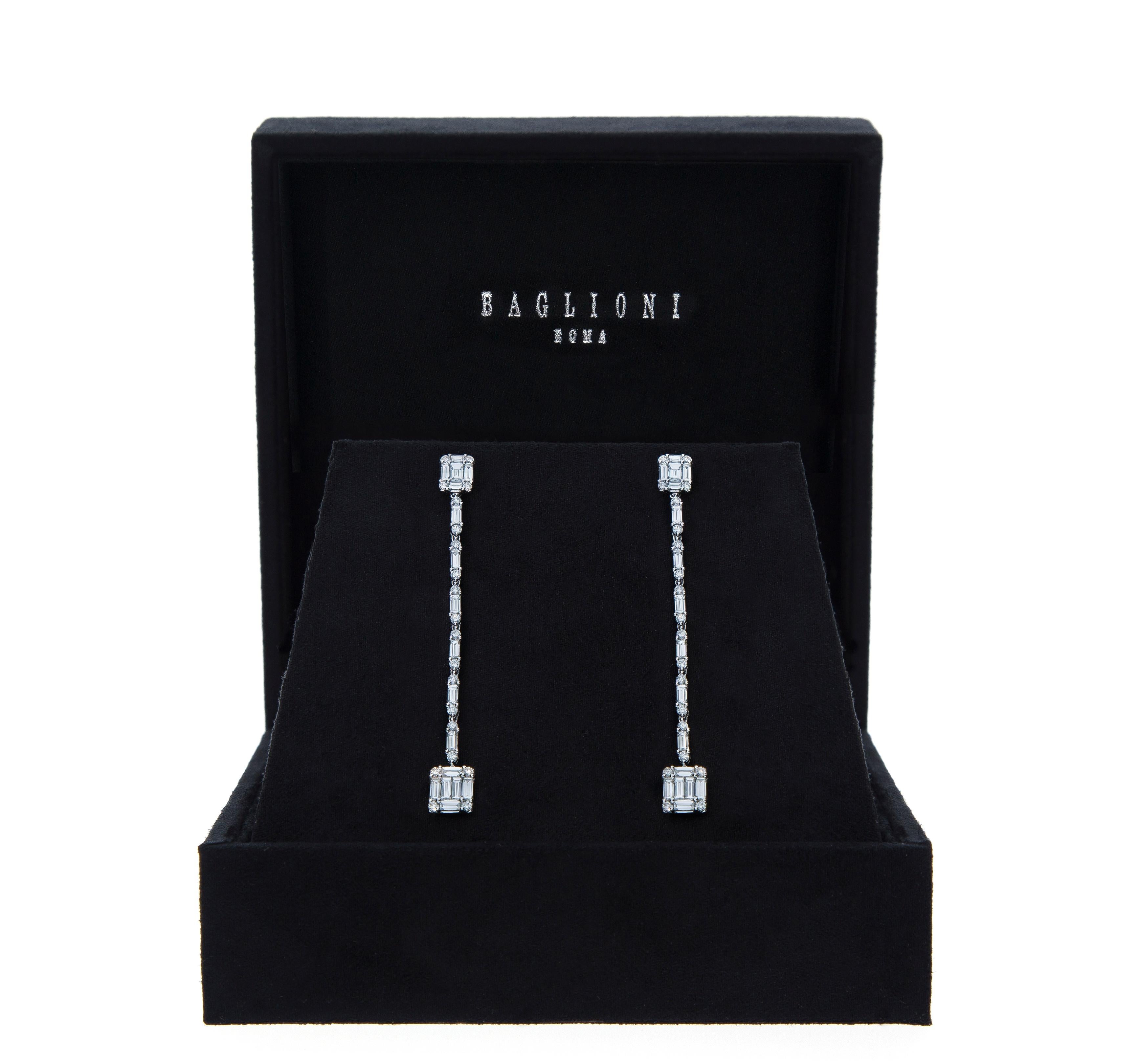 Earrings in 18kt white gold with 74 diamonds of total carat 2.22 ct. 
40 round cut diamonds total ct 0.54 
34 baguette diamonds total ct 1.68 
18kt white gold weight. grams 6.00
Each earring is composed of two upper elements in which 5 baguette-cut