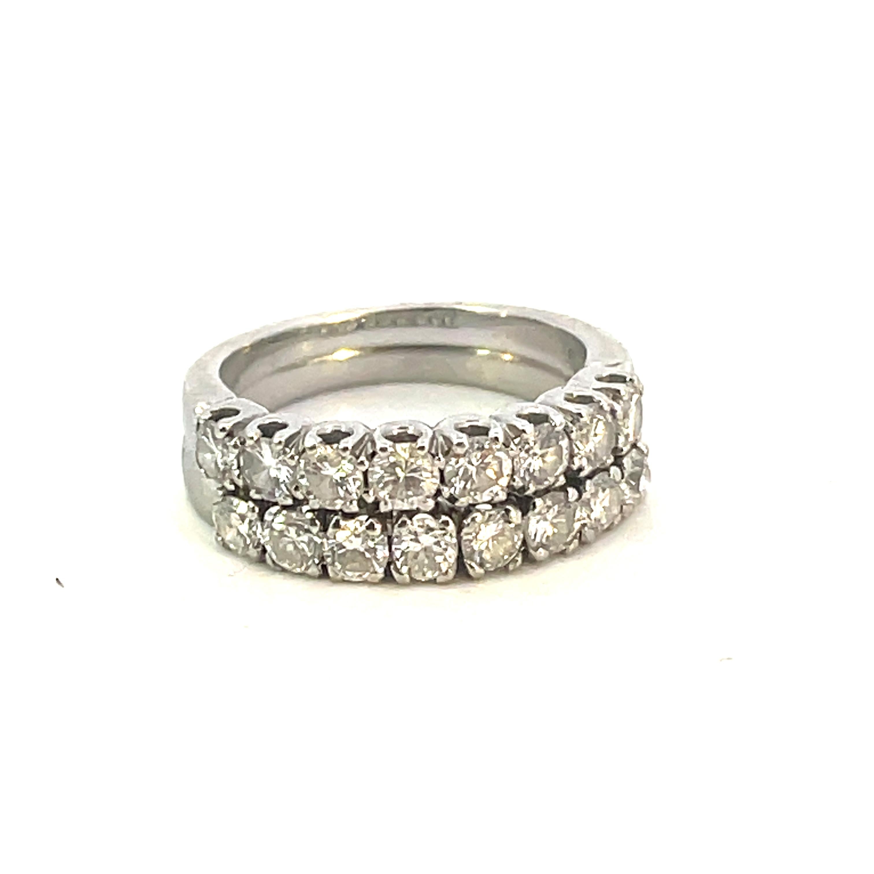 A diamond half eternity platinum ring, the seven round brilliant-cut diamonds weights all about 0.07 cts each ,  estimated to weigh 0.56 carats in total, all claw set to a 18Kt White Gold mount.

This ring is in excellent condition.

This classic