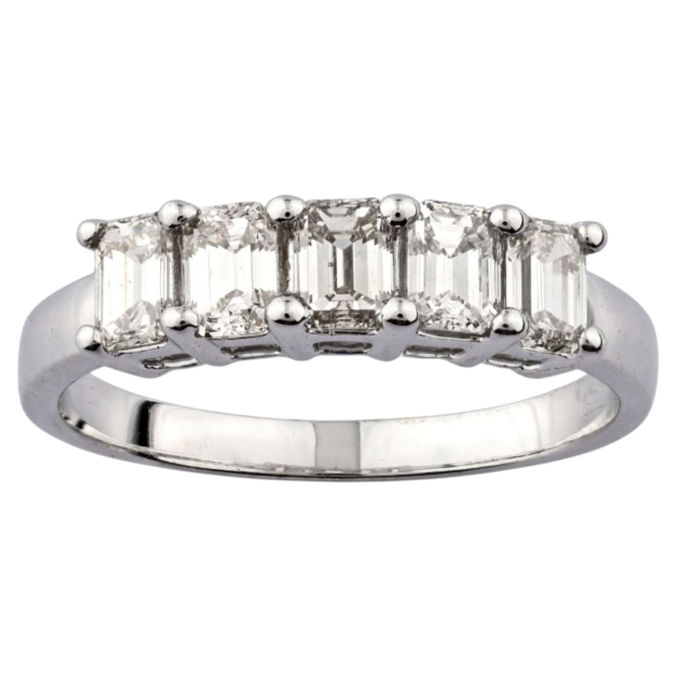 Bague à cinq pierres en or blanc 18KT, taille émeraude