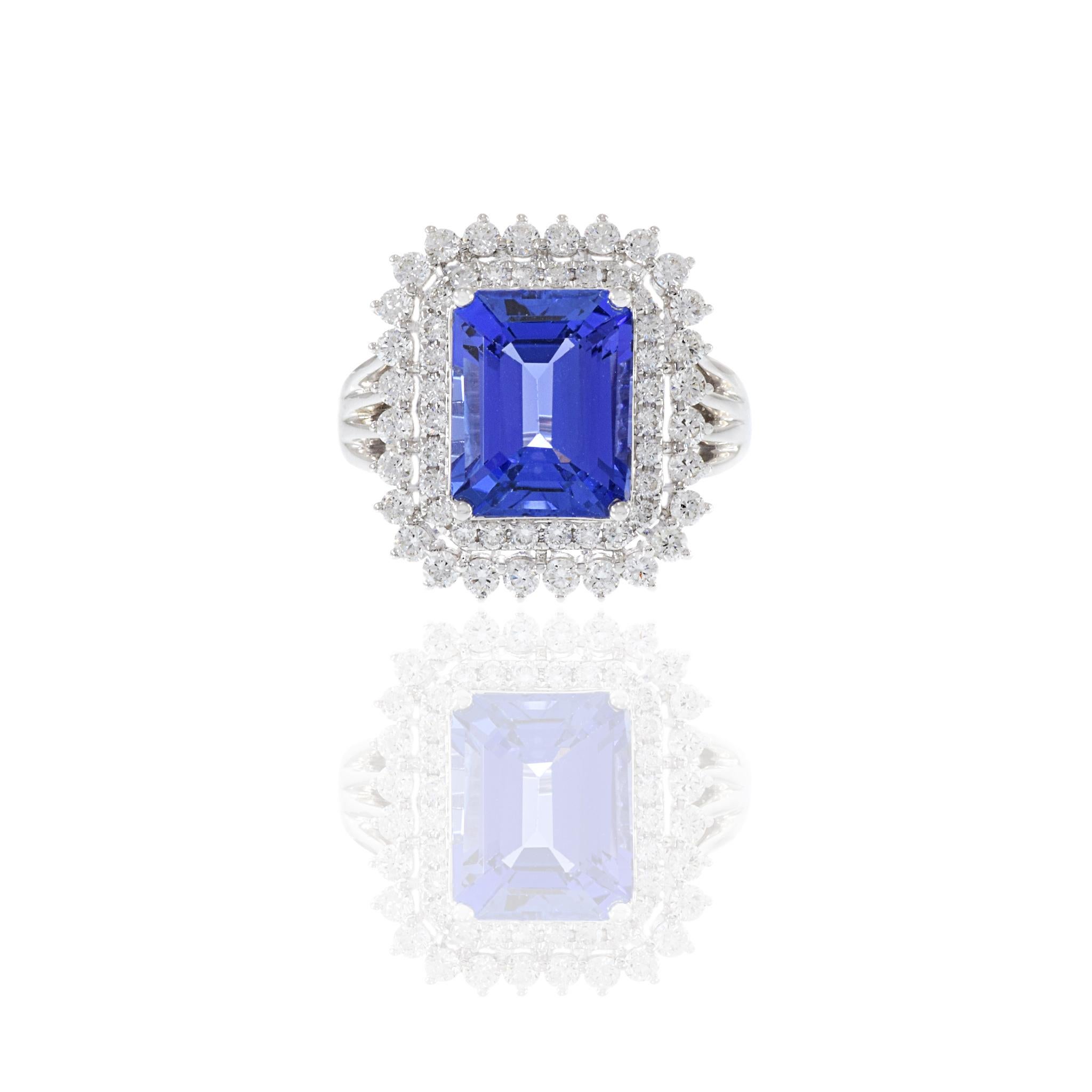 Modern 18KT White Gold Emerald Cut Tanzanite And Diamond Ring For Sale