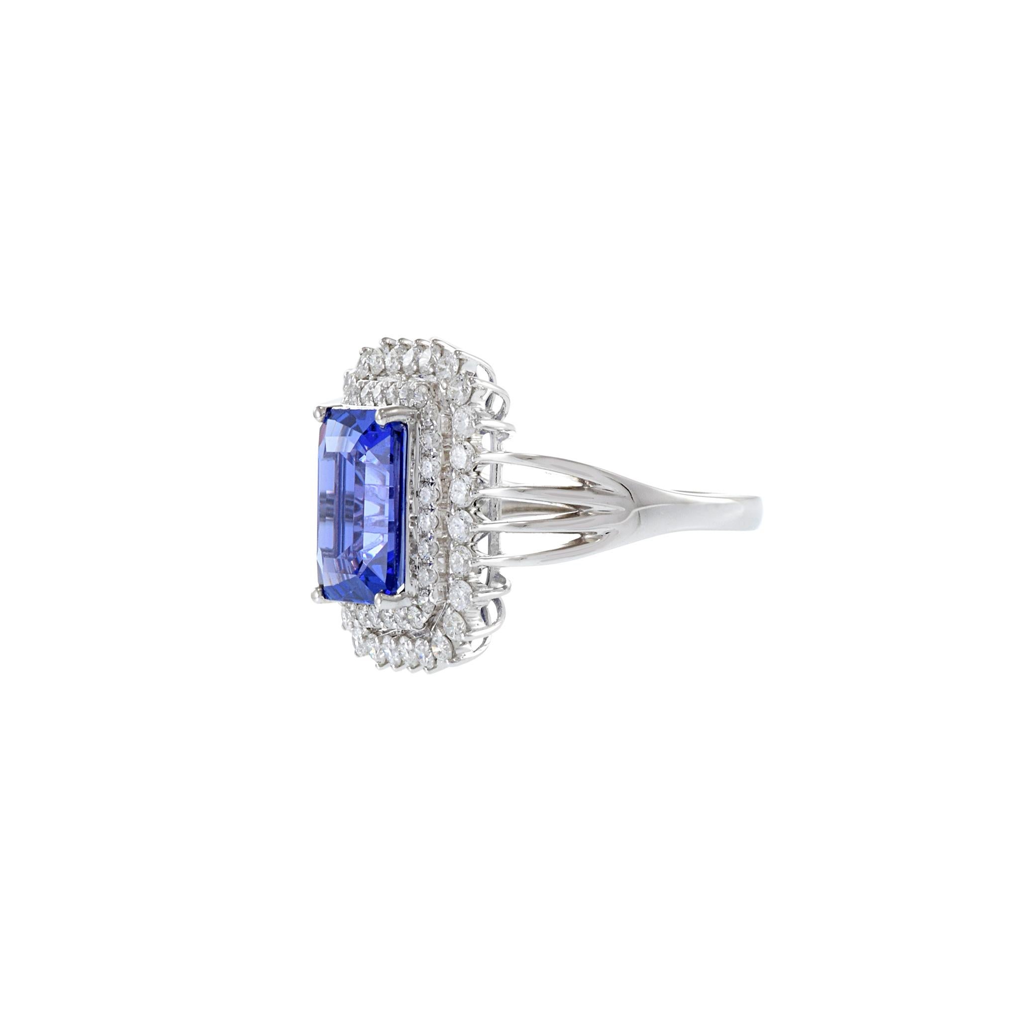 18KT White Gold Emerald Cut Tanzanite And Diamond Ring In Excellent Condition For Sale In New York, NY
