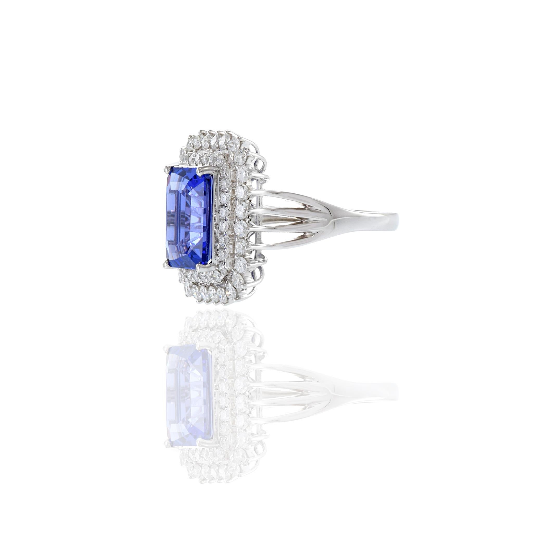 Women's or Men's 18KT White Gold Emerald Cut Tanzanite And Diamond Ring For Sale