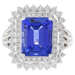 18KT White Gold Emerald Cut Tanzanite And Diamond Ring