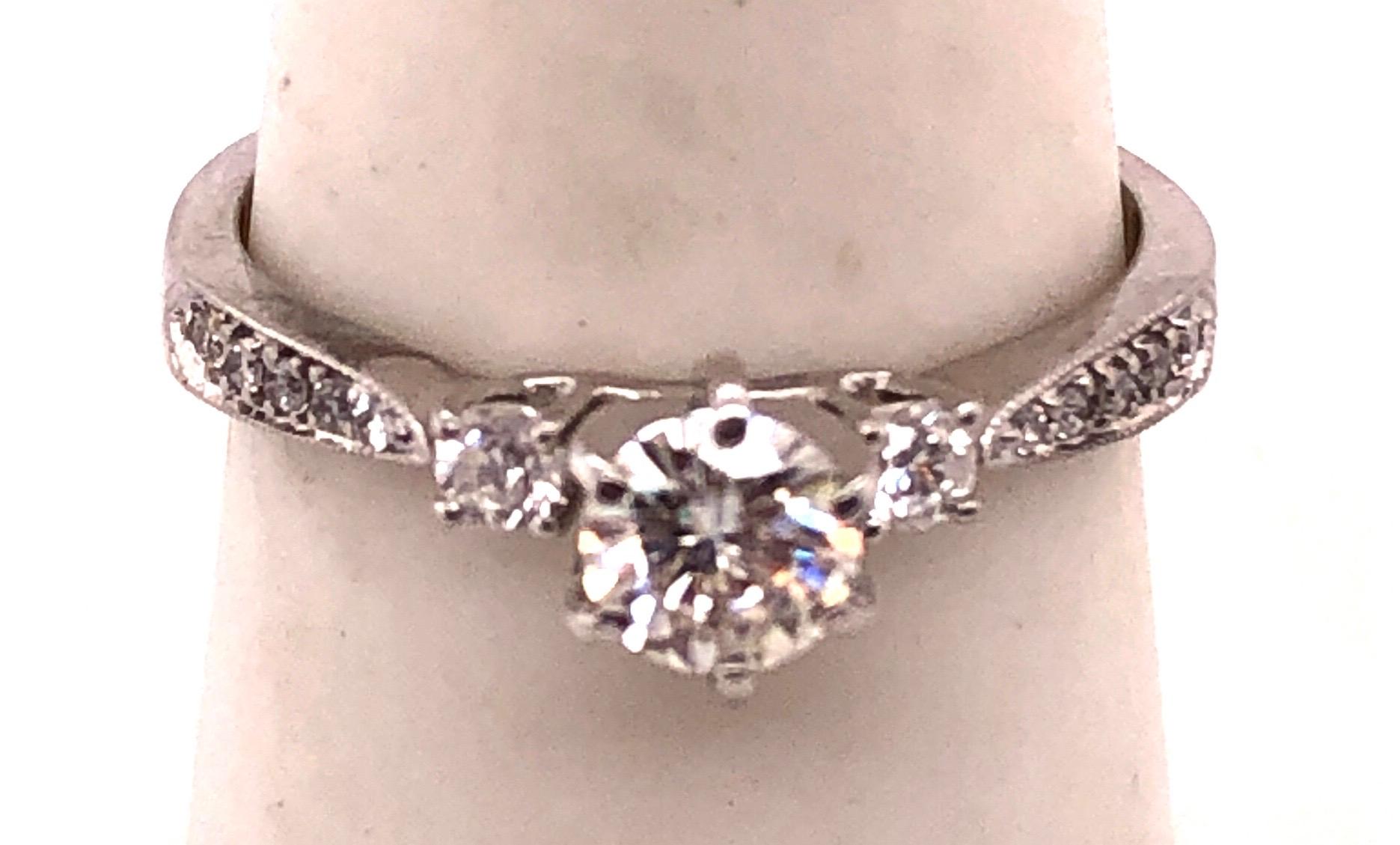 18Kt White Gold Engagement Ring 1.00 Total Diamond Weight.
Size 8 with 3.59 grams total weight.