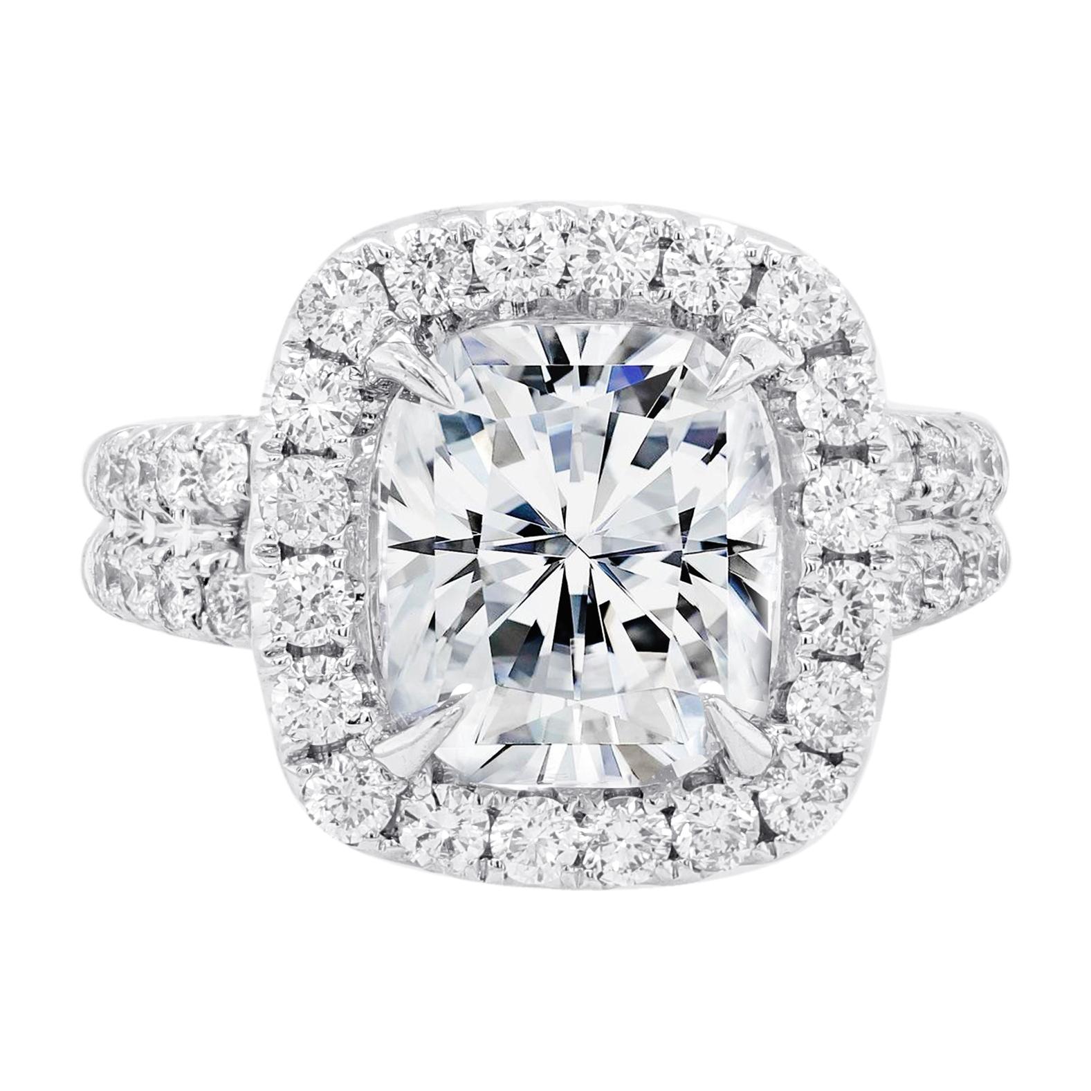 18kt white gold diamond engagement ring with GIA certified center (4.72 ct j, si1 cushion cut-radc631) with round diamonds all the way around and split shank setting, features 1.51cts of diamonds (er18570-1)
