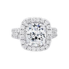 18kt White Gold Engagement Ring with Cushion Cut & Round Diamond