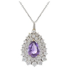 Collana con ciondolo a grappolo in oro bianco 18KT con ametista taglio pera e diamante