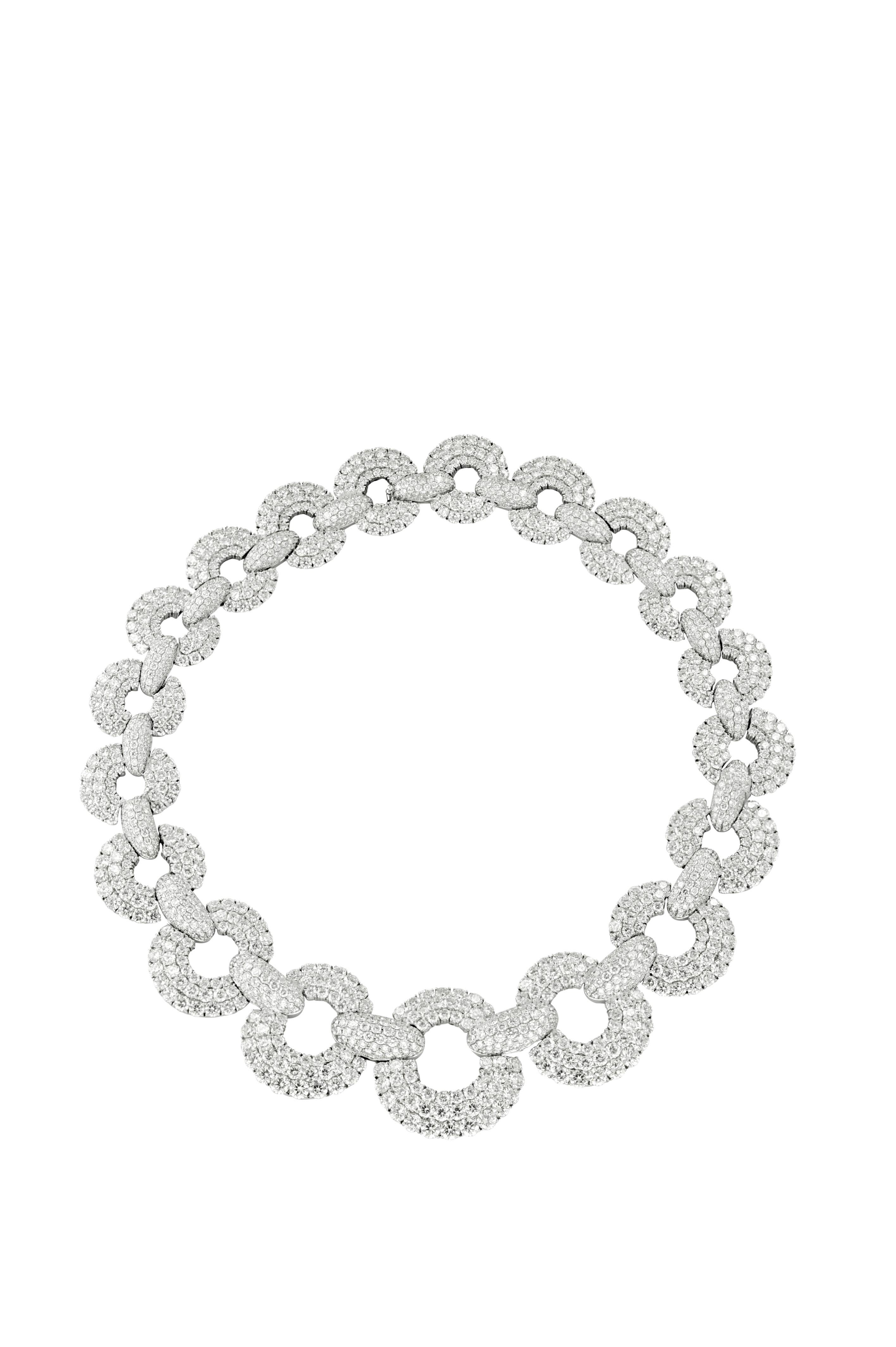 18kt white gold circle pave fashion diamond necklace linked by 19 round all diamond links featuring 107.00ct of round cut diamonds.

