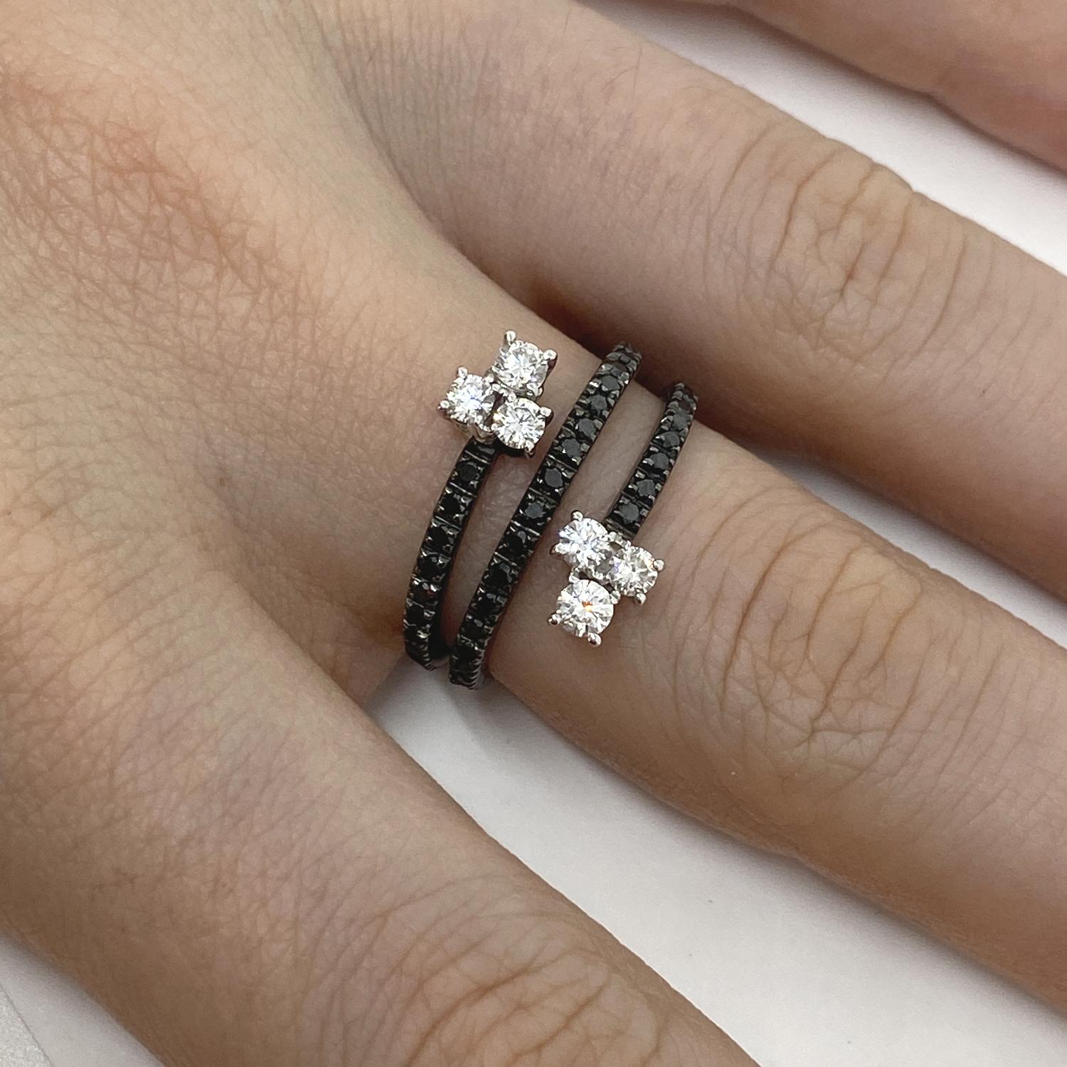 Ring made of 18kt burnished white gold with black and white natural brilliant-cut diamonds for ct.0.94

Welcome to our jewelry collection, where every piece tells a story of timeless elegance and unparalleled craftsmanship. As a family-run business