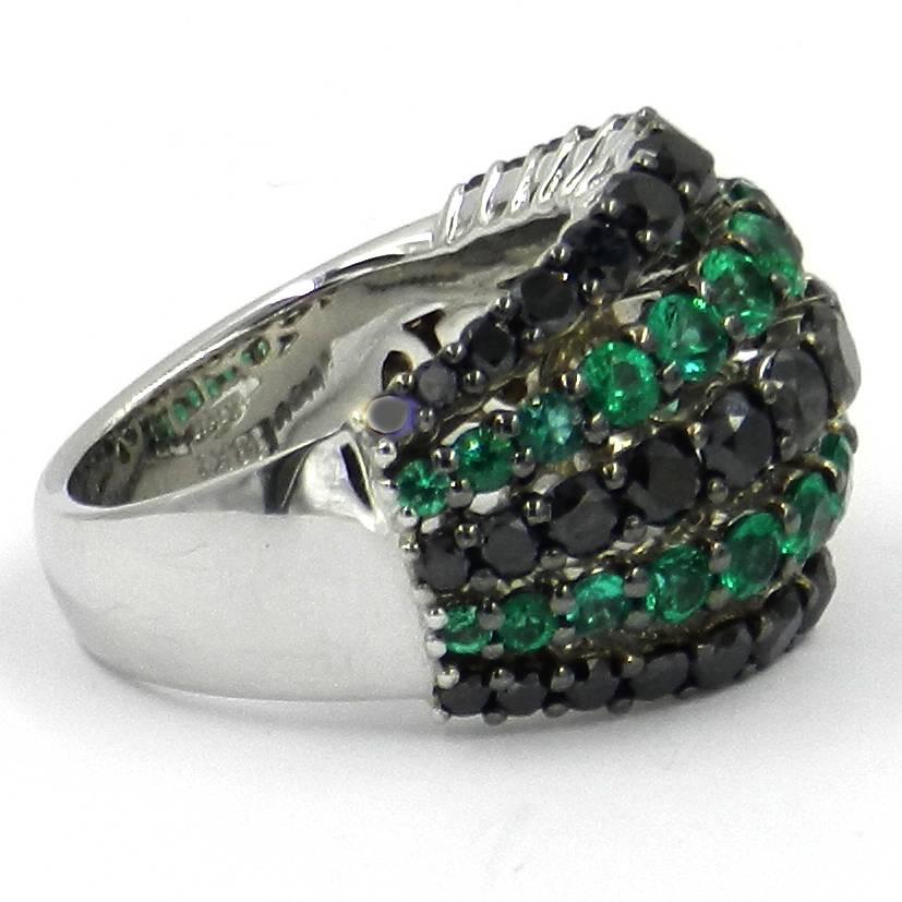 Modern 18 Karat White Gold Garavelli Ring with Black Diamonds and Emeralds For Sale