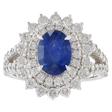 Anillo de oro blanco de 18 quilates con zafiro ovalado y diamante certificado por GIA