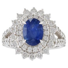 Anillo de oro blanco de 18 quilates con zafiro ovalado y diamante certificado por GIA